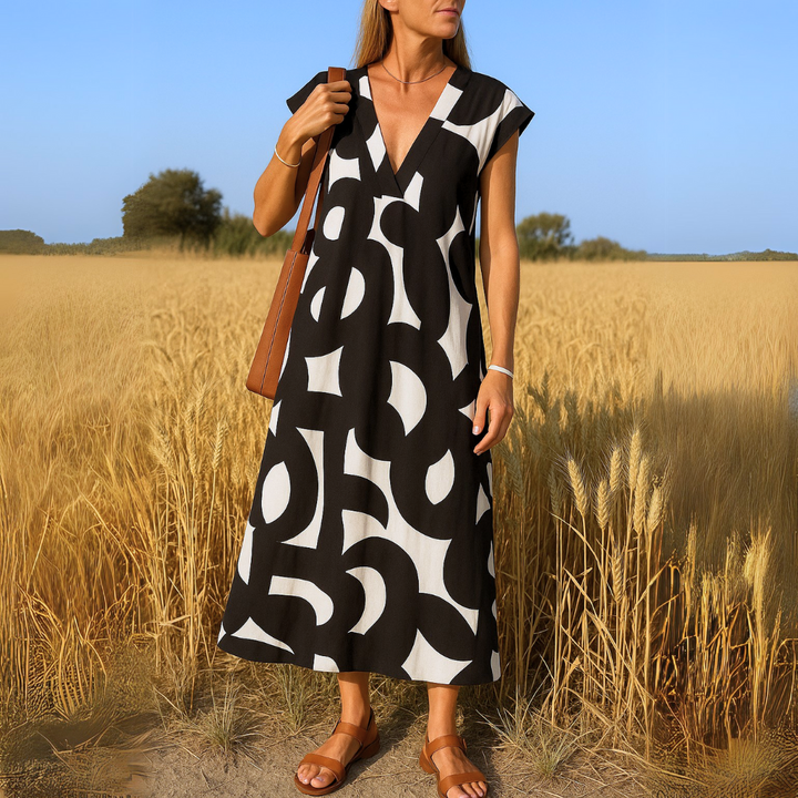 Carixa™ Elegante jurk met V-hals