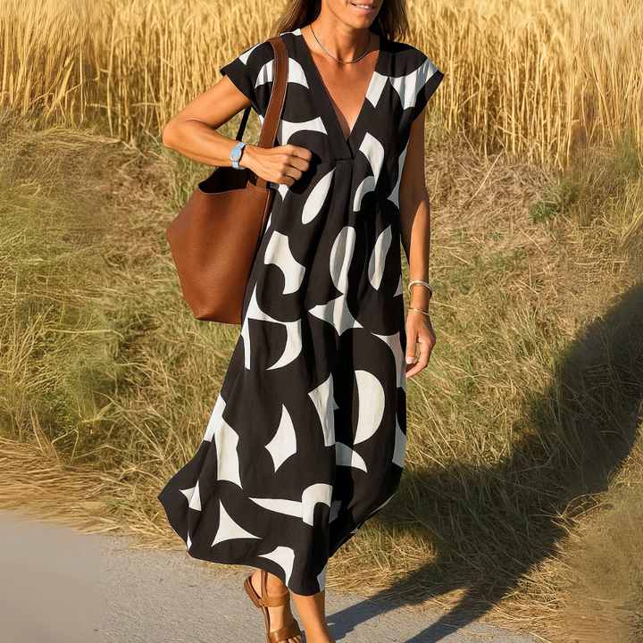 Carixa™ Elegante jurk met V-hals